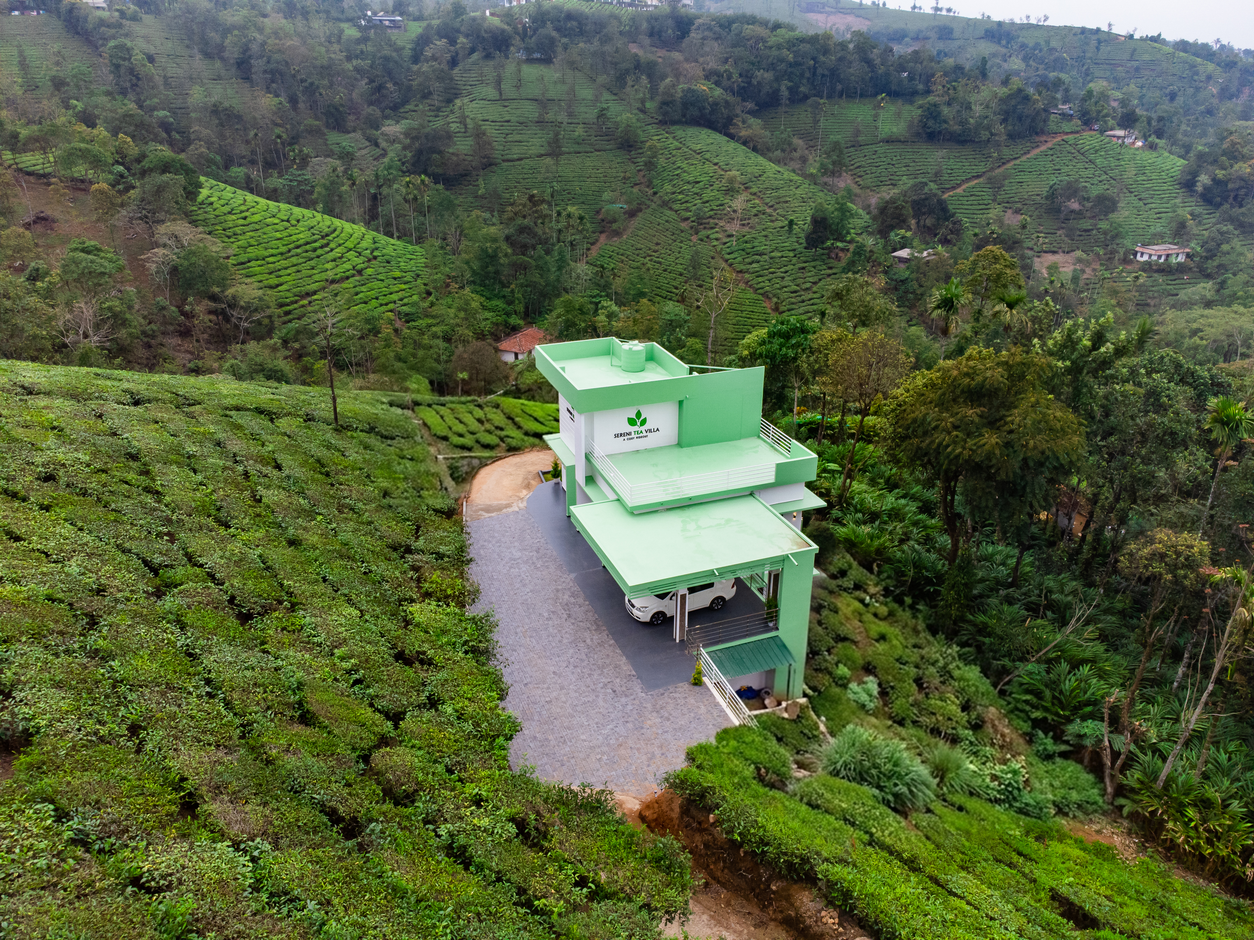 Aerial view of SereniTea Villa and surrounding Vagamon landscape